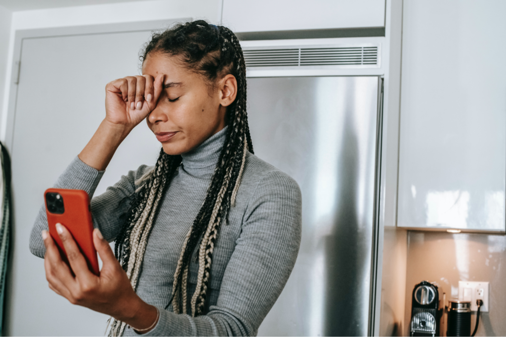 Tensed Woman Watching Her Phone