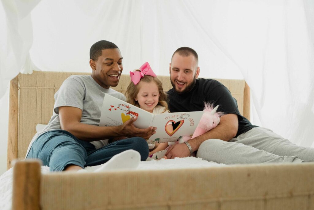 Queer Parents Helping their Baby Girl In Studies