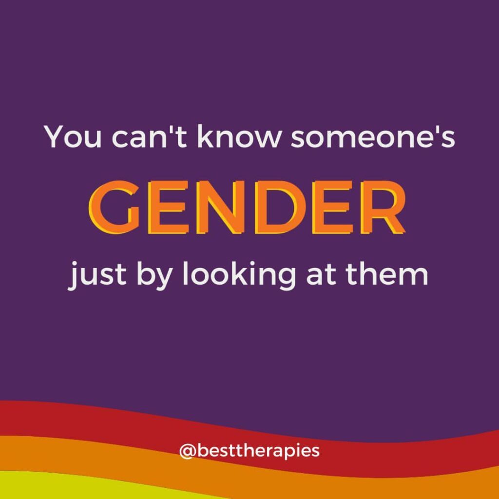 A bright purple background, with red, orange and yellow wavy stripes at the bottom. The text "You can't know someone's GENDER just by looking at them" centered over the background.